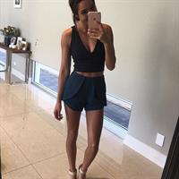 Kayla Itsines taking a selfie