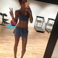 Kayla Itsines taking a selfie