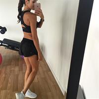 Kayla Itsines taking a selfie