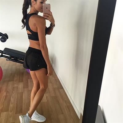 Kayla Itsines taking a selfie