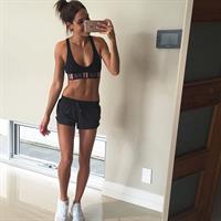 Kayla Itsines taking a selfie
