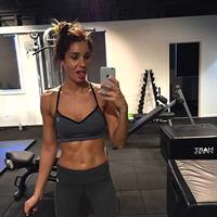 Kayla Itsines taking a selfie