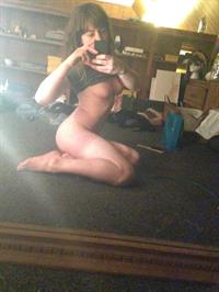 abyssmalvoid taking a selfie and - breasts