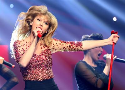 Taylor Swift on stage at the KIIS FM 2012 Jingle Ball concert at Nokia Theatre in Los Angeles - December 1, 2012 