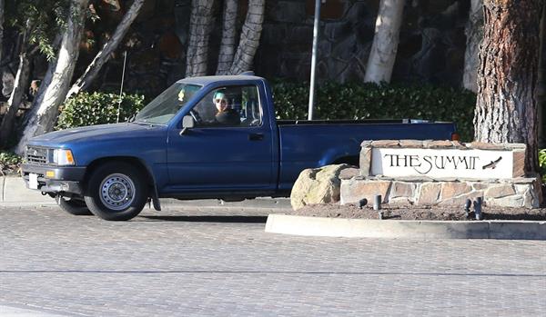 Kristen Stewart driving in Los Angeles - October 30, 2013  