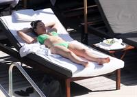 Kelly Brook bikini candids by the pool in Miami 2/1/13 