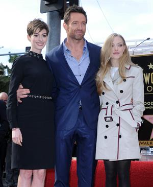 Anne Hathaway attends the Hugh Jackman Hollywood Walk Of Fame Ceremony in Hollywood December 13-2012 
