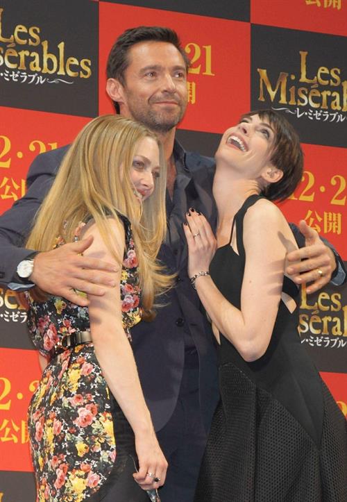 Anne Hathaway poses for photographers during an event to promote their latest movie 'Les Miserables' in Tokyo