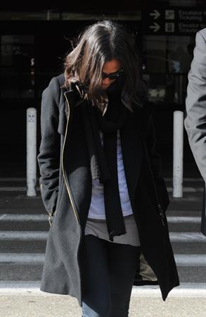 Zoe Saldana arriving into LA Airport - April 4, 2010  