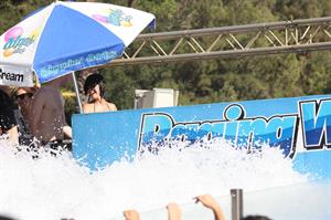 Katy Perry talks with a group of her friends after spending the afternoon at Raging Waters in San Dimas, California on August 12, 2012