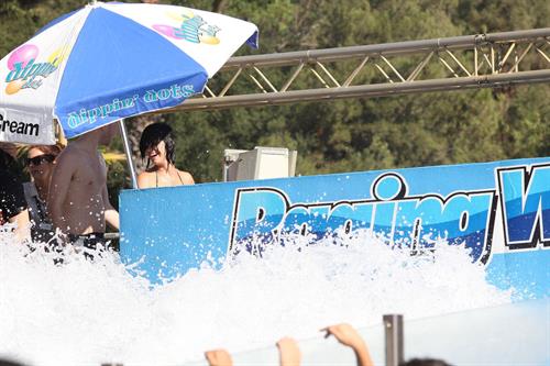 Katy Perry talks with a group of her friends after spending the afternoon at Raging Waters in San Dimas, California on August 12, 2012
