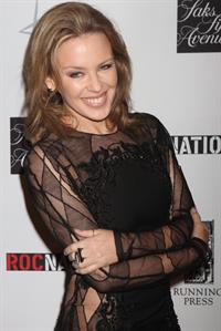 Kylie Minogue in a tight black mini dress for the launching of her book 'Kylie Fashion' at Saks Fifth Avenue