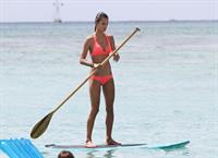 Alessandra Ambrosio paddleboarding in bikinis in Honolulu on October 12, 2011