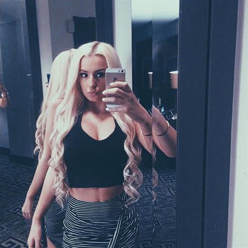 Tana Mongeau taking a selfie