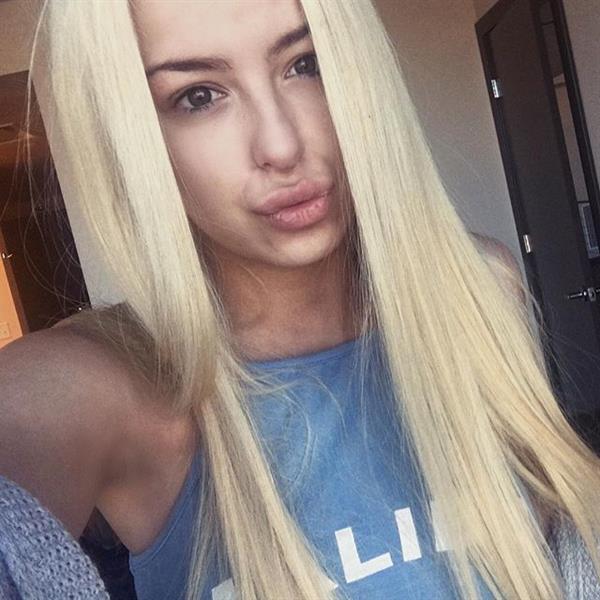 Tana Mongeau taking a selfie