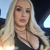 Tana Mongeau taking a selfie