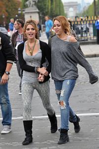 Ashley Greene and Miley Cyrus in Paris France on September 6, 2010 
