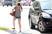Ashley Greene wearing short shorts outside her home in Los Angeles on October 17, 2011 