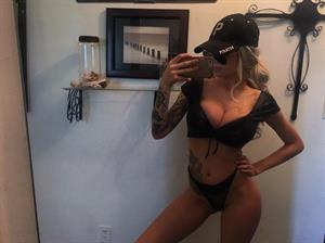 Morgan Hultgren in a bikini taking a selfie