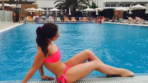 Aliya Mustafina in a bikini