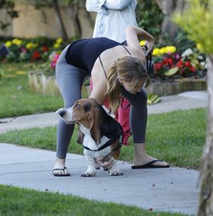 Jennifer Lawrence in Santa Monica helping a woman who fainted on June 25, 2012 