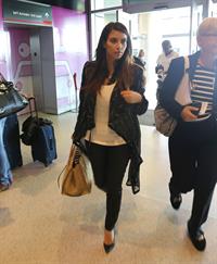 Kim Kardashian catches a flight out of Miami October 4, 2012 