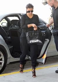 Kim Kardashian - JFK airport in New York on August 9, 2012