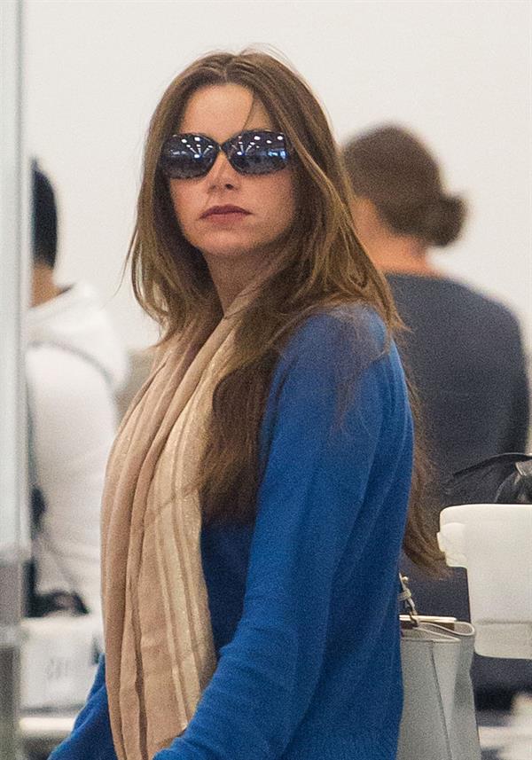 Sofia Vergara prepare to depart LAX, August 25, 2012