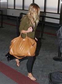 Kristen Bell - Departing on a flight at LAX - August 21, 2012