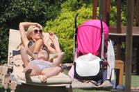 Abigail Clancy bikini candids in Italy on June 10, 2011 