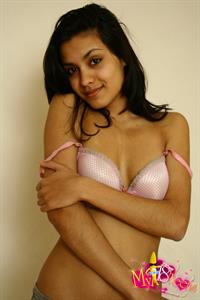 Belinda A nude on white shag carpet