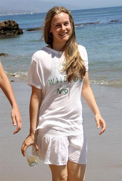 Alicia Silverstone walking on the beach in Malibu 