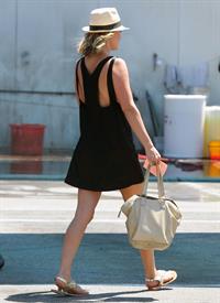 Ali Larter - Leggy in Black Dress at a Car Wash in Hollywood - August 9, 2012