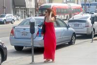 Alyson Hannigan in a red dress in Santa Monica on August 20, 2012