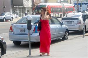 Alyson Hannigan in a red dress in Santa Monica on August 20, 2012
