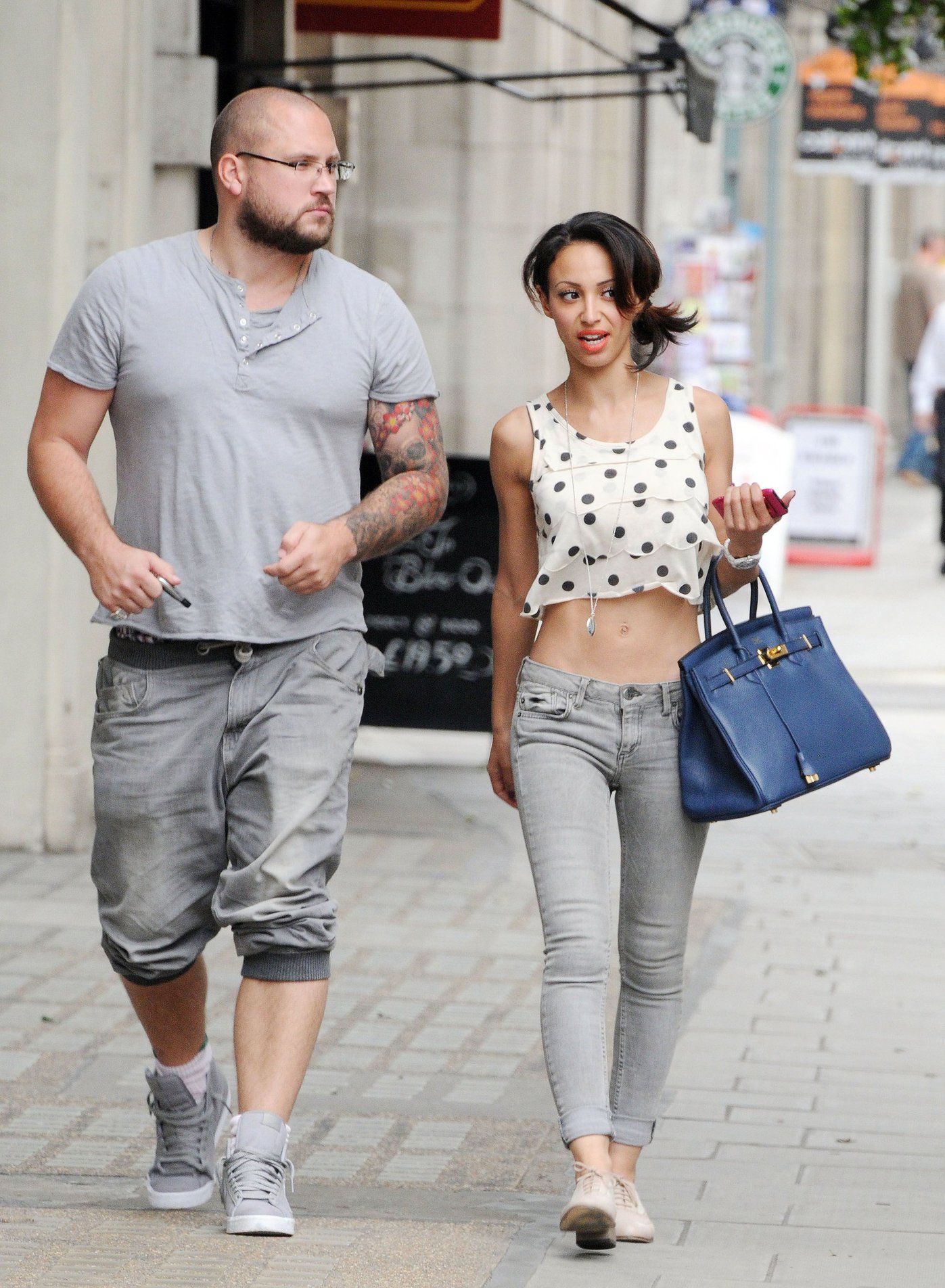 Amelle Berrabah walking in London on July 5, 2011