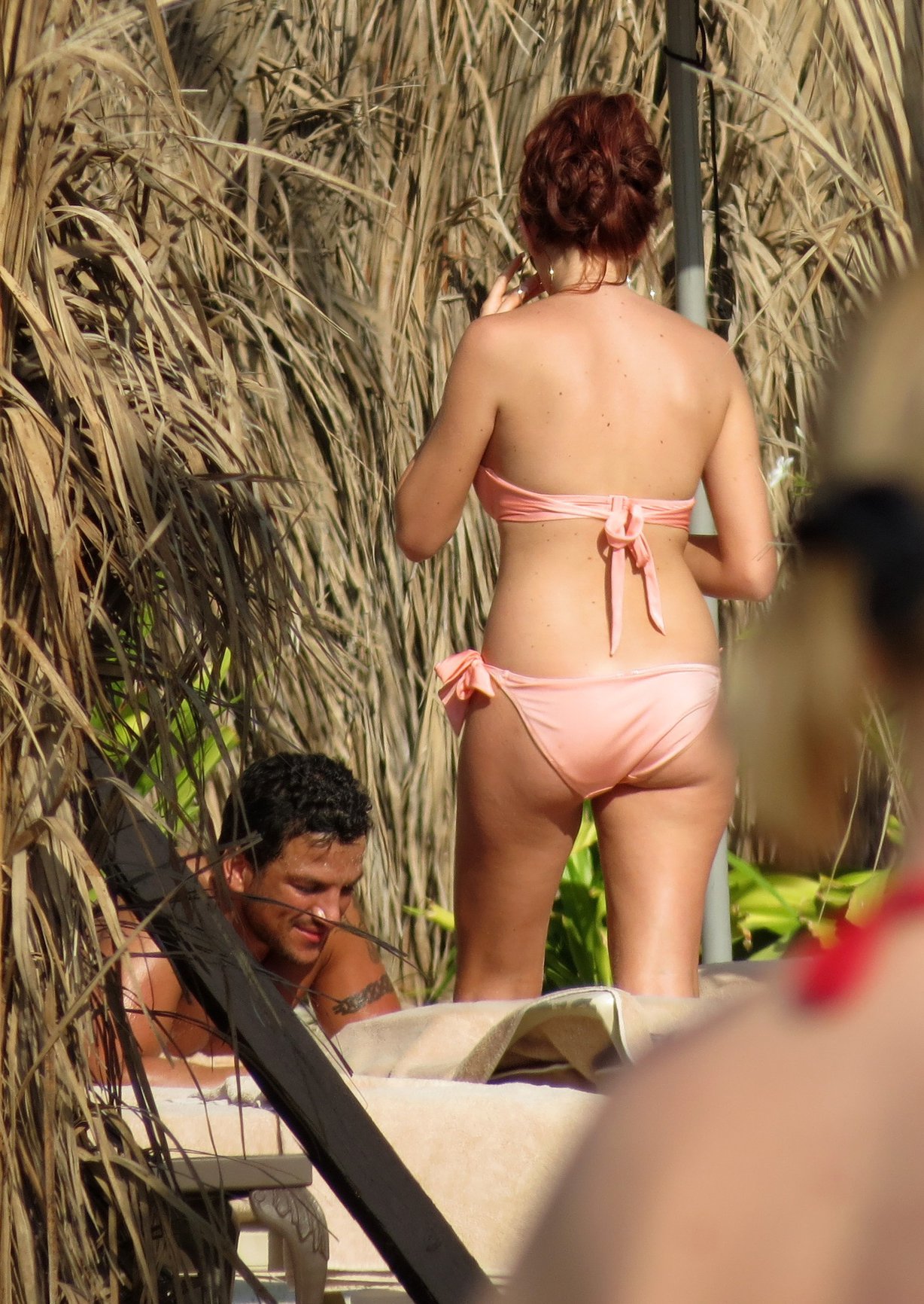 Amy Childs sunbathing with Peter Andre in Dubai on January 3, 2012