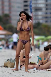Arianny Celeste bikini candids on a beach in Miami on February 16, 2012