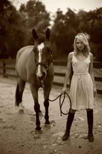 Arielle Kebbel pays tribute to her 1200 pound baby Pacific Breeze during a portrait session Los Angeles 