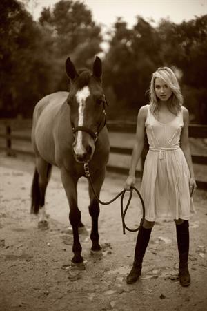 Arielle Kebbel pays tribute to her 1200 pound baby Pacific Breeze during a portrait session Los Angeles 