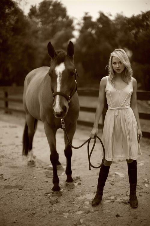 Arielle Kebbel pays tribute to her 1200 pound baby Pacific Breeze during a portrait session Los Angeles 