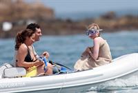 Avril Lavigne in a green bikini in Cabo, Mexico on July 27, 2012