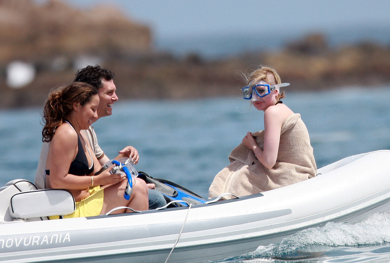 Avril Lavigne in a green bikini in Cabo, Mexico on July 27, 2012