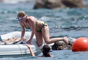 Avril Lavigne in a green bikini in Cabo, Mexico on July 27, 2012