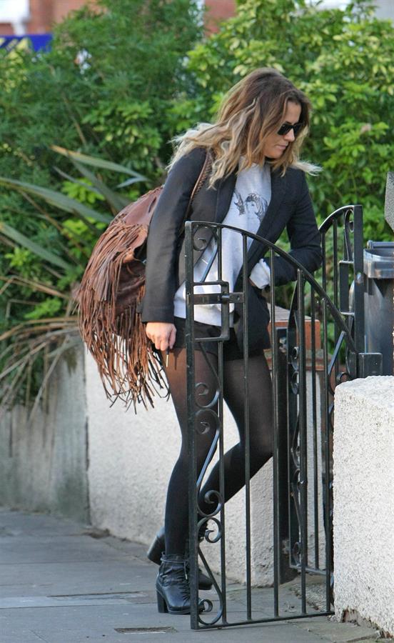 Caroline Flack leaving her London home on December 9, 2011