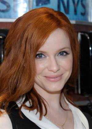 Christina Hendricks opening bell of New York Stock Exchange on March 21, 2012