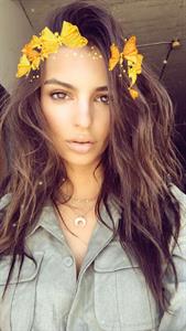 Emily Ratajkowski taking a selfie
