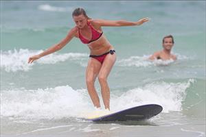 Daniela Hantuchova bikini beach surfing candids in Brisbane, Australia, December 26, 2012 
