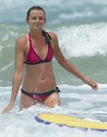 Daniela Hantuchova bikini beach surfing candids in Brisbane, Australia, December 26, 2012 