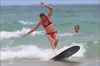Daniela Hantuchova bikini beach surfing candids in Brisbane, Australia, December 26, 2012 